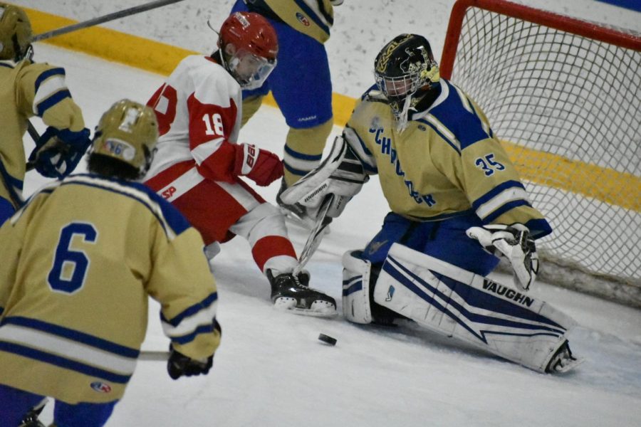 Colin S. blocking a shot from Penfield