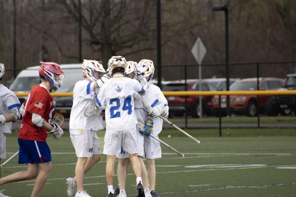Navigation to Story: (4/14) Warrior Boys Lacrosse – V/VJ Galleries